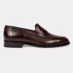 Mocassins fabriqués avec du cuir de première qualité. Ces mocassins Paul Smith marron présentent un design intemporel avec un bout mocassin et un détail de selle surpiqué.