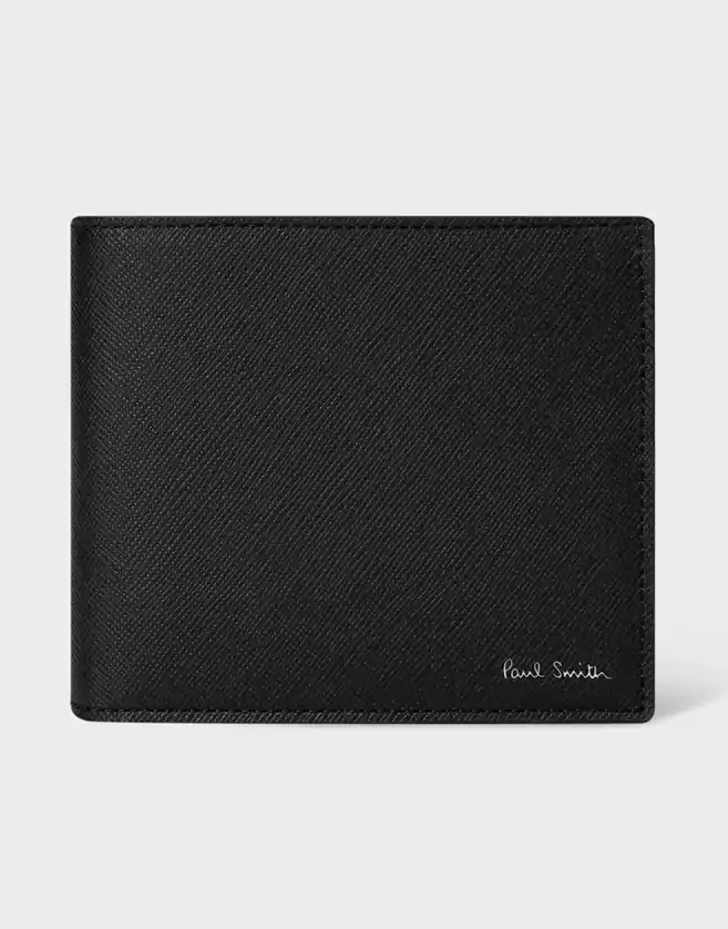 Portefeuille fabriqué à partir d'un assemblage en cuir de luxe avec une finition texturée, ce portefeuille noir présente un imprimé saisonnier « Mini » à l'intérieur.