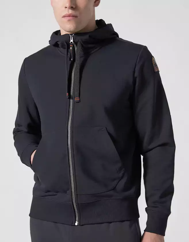 Sweatshirt Parajumpers à capuche avec une ouverture zippée. Intérieur en polaire, coton et polyester.