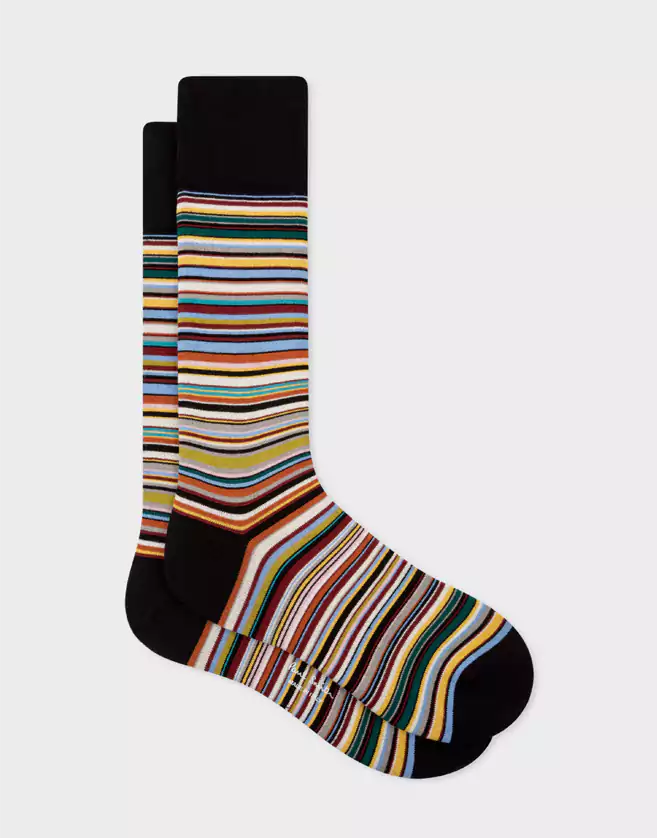 Ces chaussettes Paul Smith multicolores sont ornées de le « Signature Stripe ». Elles sont dotées d'un talon et de bouts noires. Fabriquées en Grande-Bretagne à partir d'un doux mélange de coton.