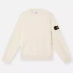 Pull Stone Island ras-du-cou en maille de coton biologique doux avec bandes en point jersey, manches raglan et détails côtelés.